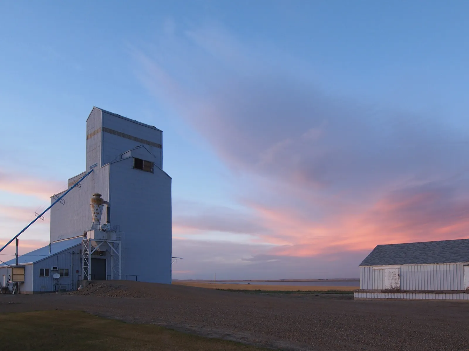 Grain elevator in Hussar, Alberta, at sunset